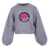 Mond Kiss Reversible Paillette Opnaai Embleem Patch op een grijze sweater