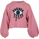 Oog Tranen Paillette XL Strijk Patch Embleem op een roze sweater
