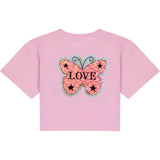 Vlinder Reversible Paillette Love Tekst XL Op Naai Patch op een roze t-shirtje