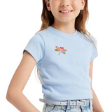 Libelle Vlinder Strijk Embleem Patch op een lichtblauw t-shirtje