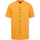 Bloem Bloemetje Strijk Embleem Patch Groen samen met de oranje versie   op een oranje t-shirtje