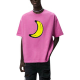 Banaan Reversible Paillette Strijk Embleem Patch op een roze t-shirt