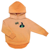 What Tekstwolkje Comic Style Strijk Embleem Patch op een kleine oranje hoodie samen met een groene heks patch