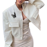 Embleem Opnaai Fashion Part Strass Kralen op een wit jasje