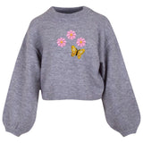 Vlinder Strijk Applicatie Embleem Patch Geel op een grijze sweater samen met drie roze madeliefjes strijk patches