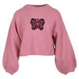 Vlinder Strijk Embleem L Patch op een roze sweater