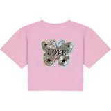Vlinder Reversible Paillette Love Tekst XL Op Naai Patch op een roze t-shirtje