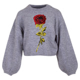 Roos Paillette XXXL Strijk Embleem Patch op een grijze sweater