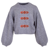 Drie maal de Tribal Paillette Rood Cosplay Sequins Strijk Embleem Patch op een grijze sweater
