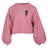 Dromenvanger Strijk Embleem Patch Pastel op een roze sweater