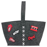 Gymp Sneaker Schoen Strijk Embleem Patch samen met andere rood witte strijk patches op een grijs vilten tas