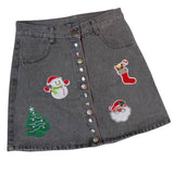 Kerst Kerstsok Strijk Embleem Patch S samen met andere kerst strijk patches op een kort grijs rokje