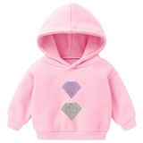 Diamant Strijk Embleem Patch Glitter Roze samen met de zilverkleurige variant op een kleine roze hoodie