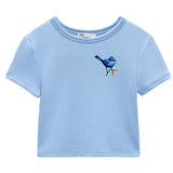 Vogel Vogeltje Tak Strijk Embleem Patch Blauw op een kort lichtblauw t-shirtje