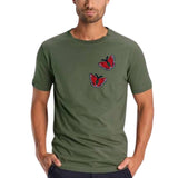 Twee maal de Vlinder Rood Zwart Strijk Applicatie Patch op een groen t-shirt