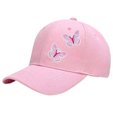 Twee maal de Vlinder Paillette Strijk Embleem Patch Roze Wit op een roze cap