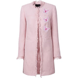 Drie mala de Vlinder Paillette Strijk Embleem Patch Roze Wit op een roze colbert jas