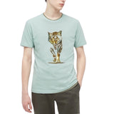 Wolf Sluipend Strijk Applicatie op een lichtgroen t-shirt