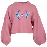 Bloesem Kolibrie Strijk Embleem Patch Set op een roze sweater