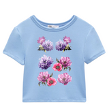 Anemoon Bloem Full Color Strijk Applicatie op een lichtblauw t-shirt
