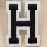 Zwarte Alfabet Letter H Met Witte Rand Strijk Patch