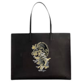 Draak Draken Dragon Strijk Embleem Patch op een zwarte leren tas