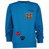 Hart Hartje Oogjes Strijk Embleem Patch Zwart samen met de rode variant en een Amsterdam strijk embleem  op een blauwe sweater