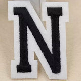 Zwarte Alfabet Letter N Met Witte Rand Strijk Patch