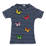 Groen / Zwarte Vlinder Strijk Embleem Patch samen met andere vlinder strijk patches op een donker blauw met wit gestreept t-shirtje