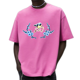 Bloesem Bloemen Vogel Strijk Embleem Patch Set Blauw op een roze t-shirt