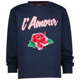 Pioen Roos Bloem XL Strijk Embleem Patch op een donkerblauwe sweater met L' Amour tekst