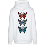 Drie verschillende kleuren van de Vlinder Strijk Embleem Patch Artistiek Blauw Large op de rugzijde van een witte hoodie