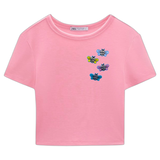 Bij Bijen Strijk Embleem Patch Geel samen met drie andere kleuren op een roze t-shirtje