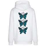 Drie maal de Vlinder Strijk Embleem Patch Artistiek Blauw Large op de rugzijde van een witte hoodie