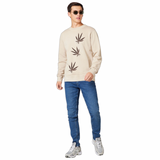Drie maal de Hennep Wiet Weed Blad Cannabis Strijk Embleem Patch op een ecru gekleurde sweater 