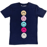 Roze Glitter Smiley Emoji Strijk Embleem Patch samen met vier ander gekleurde smiley strijk patches op een blauw t-shirtje