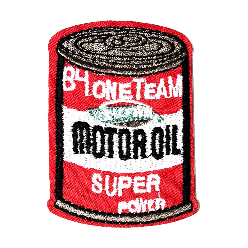 Hoofdzakelijk rode patch van een blije motor olie met daarop de tekst super power en B4 one team