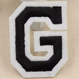 Zwarte Alfabet Letter G Met Witte Rand Strijk Patch